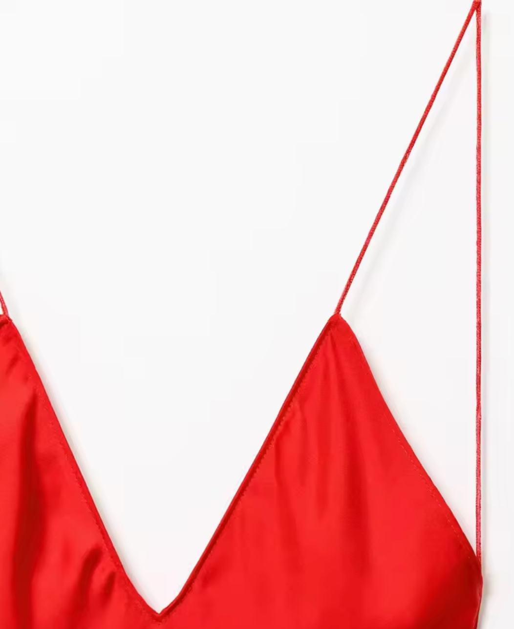 Red dress up close against light background