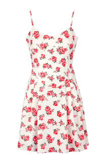Dress with flower print against light background